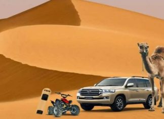 Morning, Night & Overnight Abu Dhabi Desert Safaris Four wheel drive vehicle crossing golden desert sand dunes