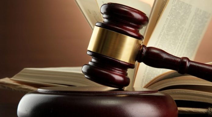 The Advantages of Hiring an Assault Lawyer Gavel and legal documents on a lawyer's desk