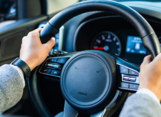 How to Save on Insurance With a New York Dmv-Approved Defensive Driving Course: Proven Tips Driver at the wheel on a busy city road
